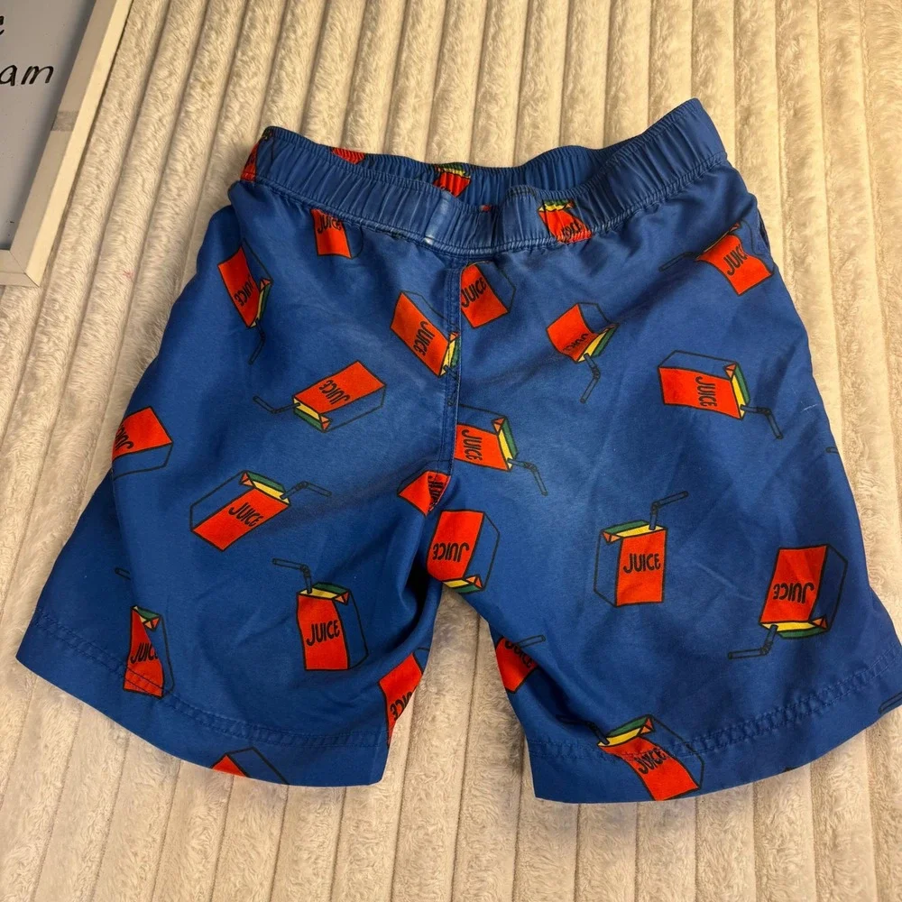 Hanna Andersson Boys Blue Juice Box Print Swim Trunks Quick Dry Mesh Lining 10